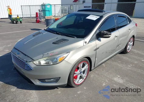 2015 Ford Focus Titanium from USA, damaged, VIN 1FADP3J26FL341446